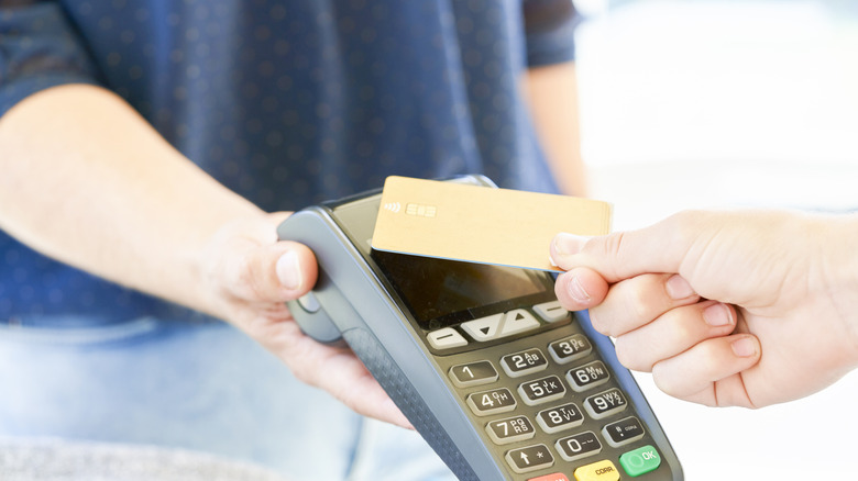 tapping a card to pay for something