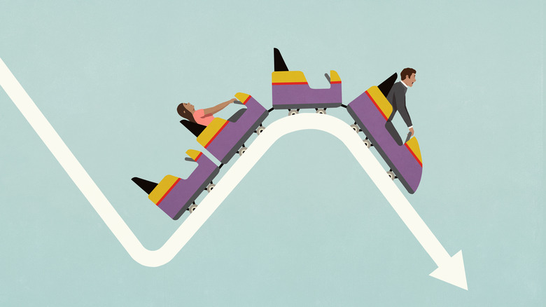 cartoon of rollercoaster car on downward stock arrow