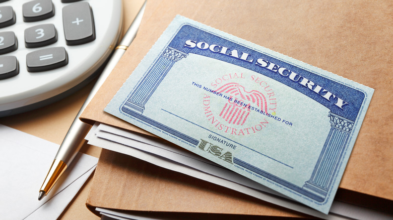 Social Security card with files