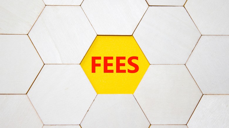 fees written inside hexagon blocks