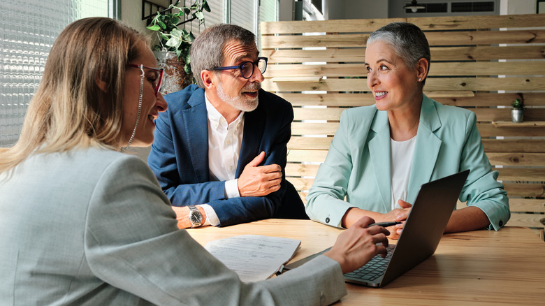 a financial advisor and clients