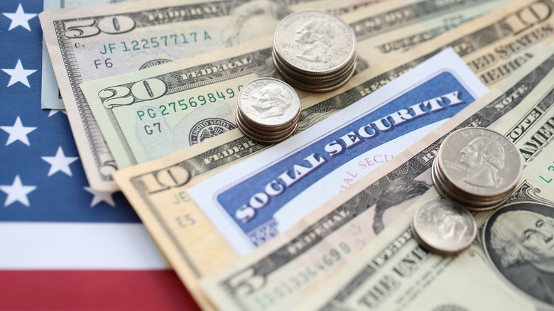 Image of American dollars and coins and social security card