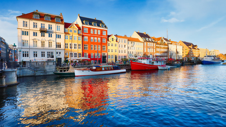 View of houses along a river in Copenhagen, capital city of Denmark