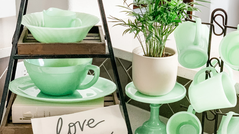 Examples of jadeite items on shelf display, table