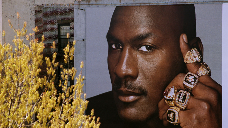 NBA basketball legend with several championship rings.