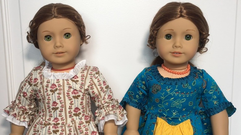 A 35th Anniversary Felicity Merriman doll to the left of a BeForever Felicity Merriman doll
