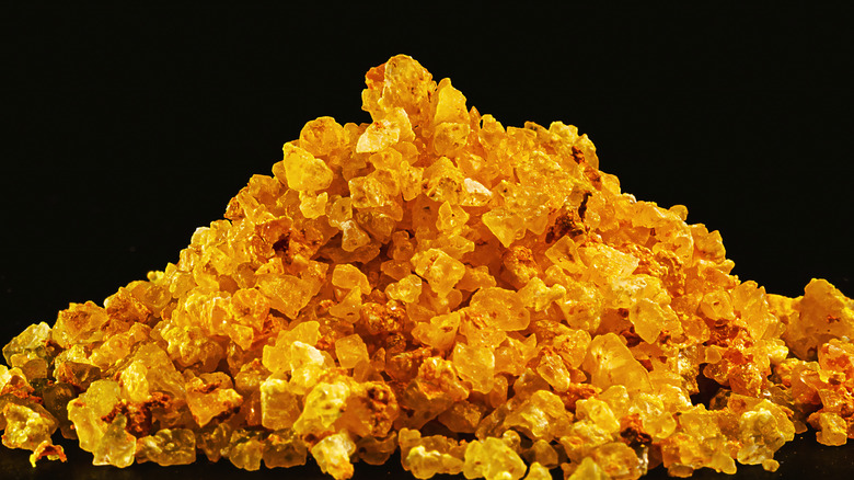 Pile of uranium rocks with black background