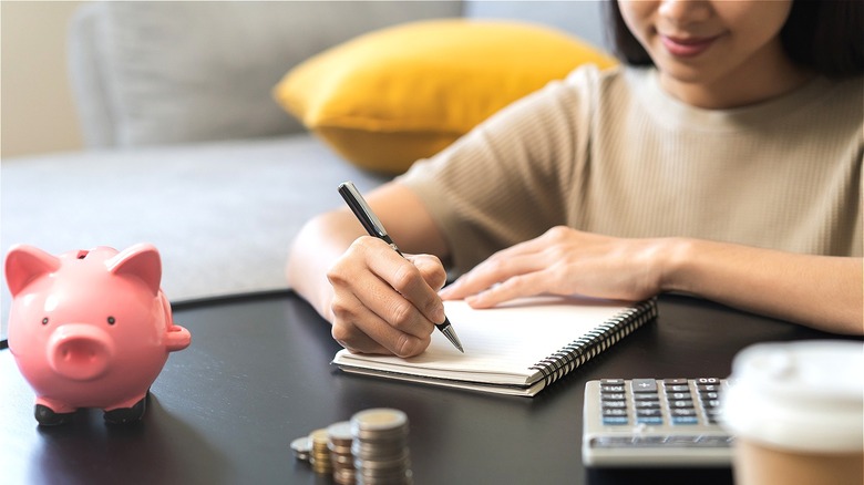 Person working on her budgeting