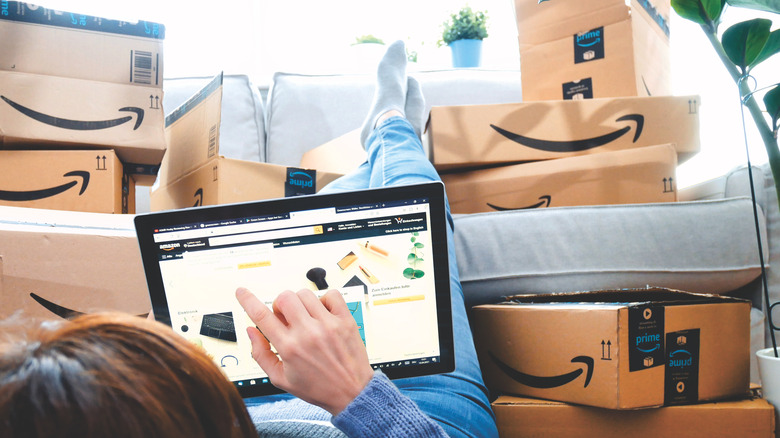 Amazon shopper surrounded by boxes