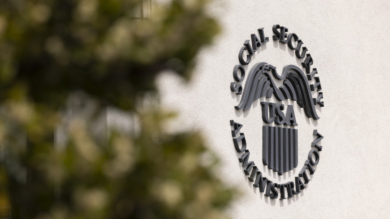 The Social Security logo on the exterior of a building.