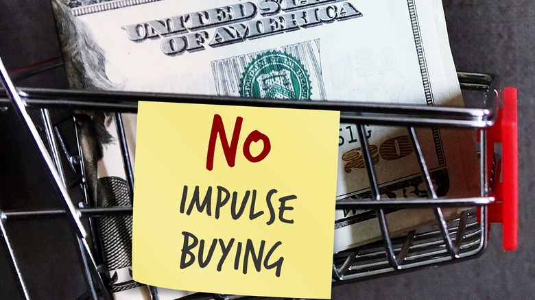 Grocery cart with $20 and "No impulse buying" note