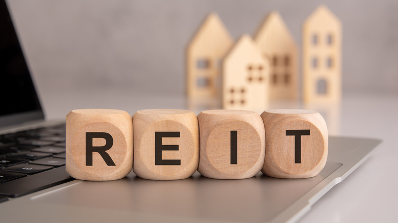 REIT spelled in blocks