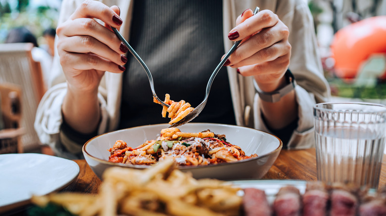 Person eating at a restaurant