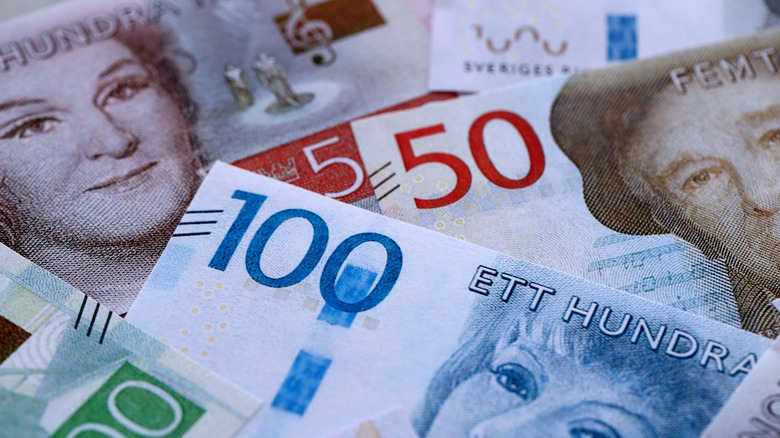 A pile of Swedish krona bank notes.