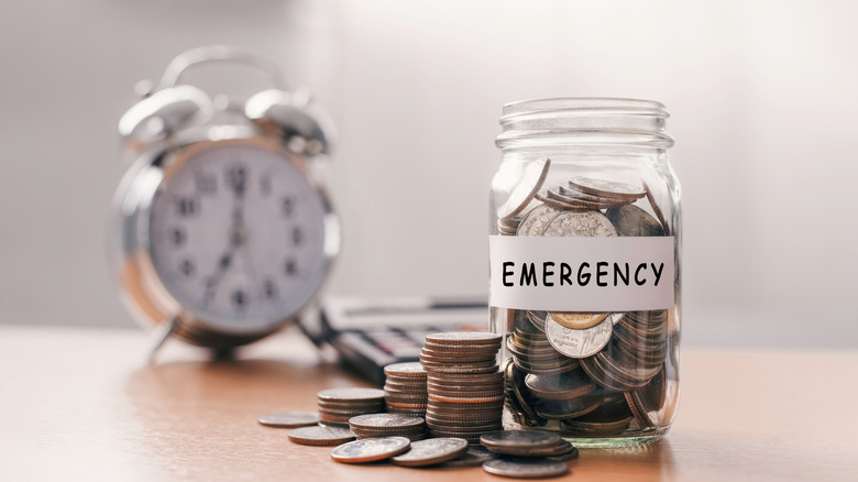 coin jar with emergency label