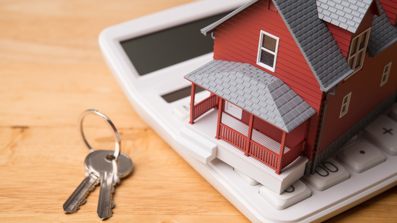 house, keys, and calculator