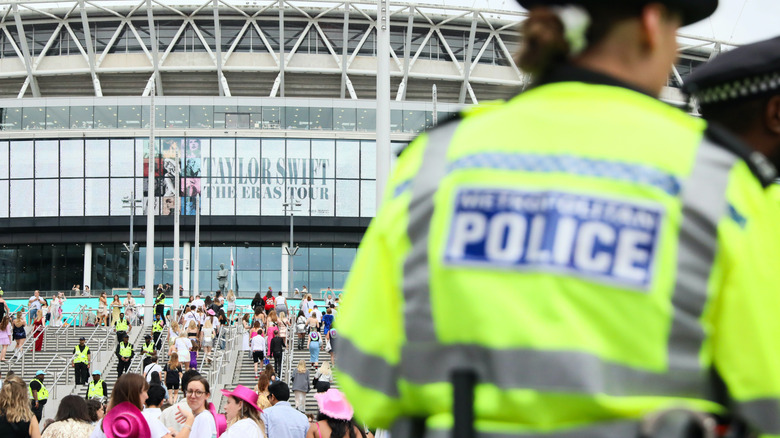 Police standing outside of stadium for Taylor Swift's Eras Tour
