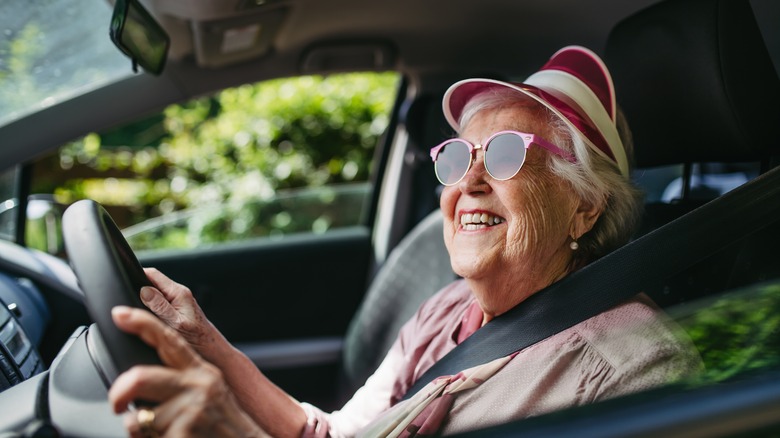 mature woman behind the wheel of a vehicle