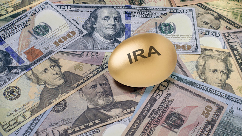 IRA on a golden egg on top of money