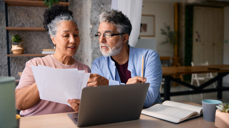 senior couple discussing finances
