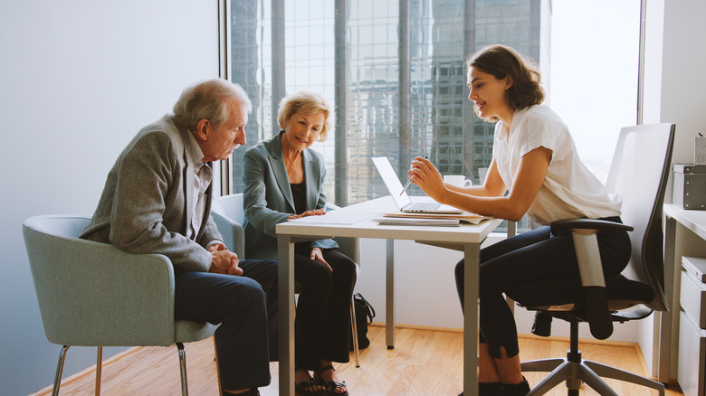 seniors talking to financial advisor