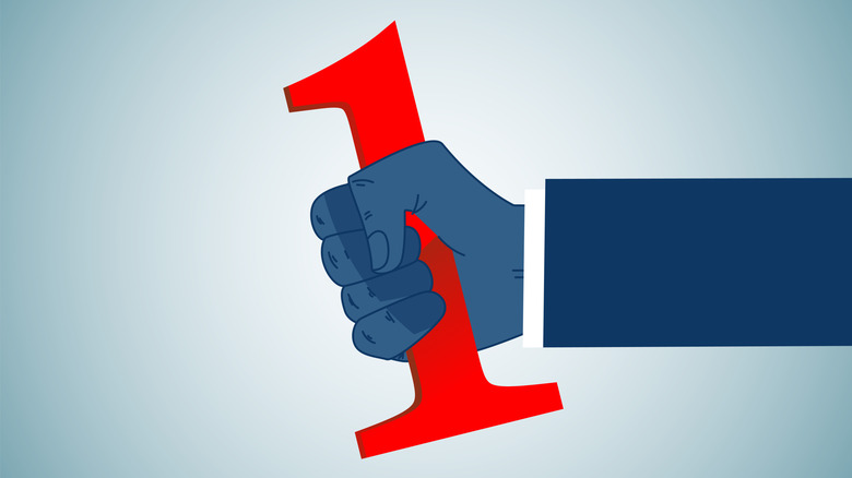 image of a hand grabbing the number one