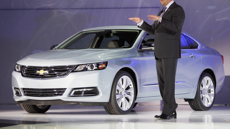 President of General Motors North America, introduces the newly unveiled 2014 Chevrolet Impala