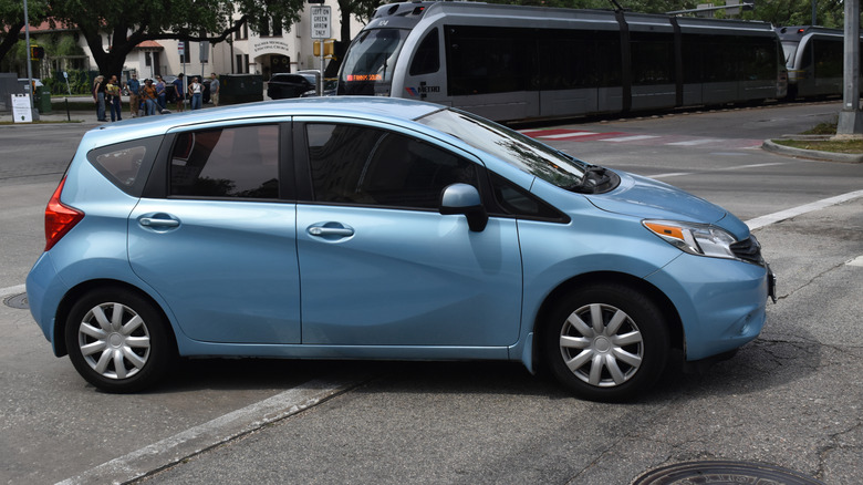 a blue Nissan Versa