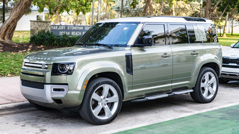 Land Rover Defender SUV parked on a street.