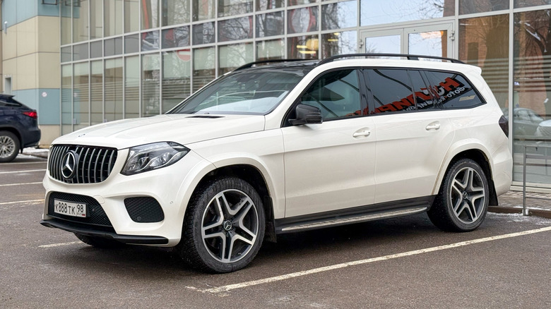 White Mercedes-Benz GLS I (X166) parked on street.