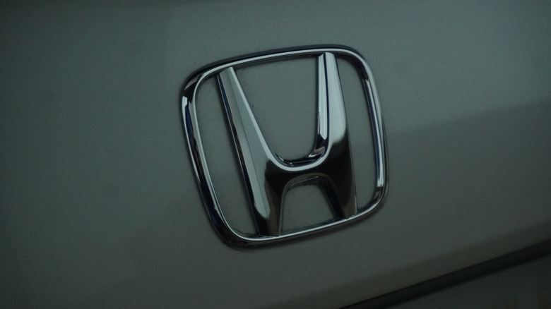 A close-up view of the iconic Honda logo on Honda Civic