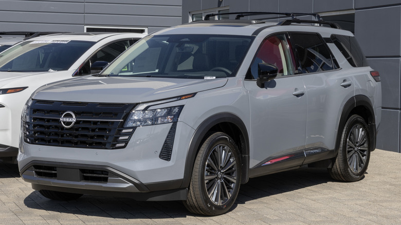 Nissan Pathfinder Platinum 4WD Mid-Size SUV at a dealership.