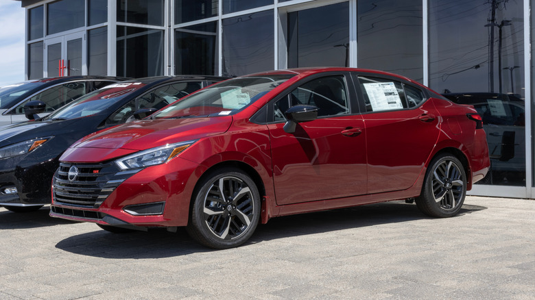 Nissan Versa SR sedan display at a dealership.