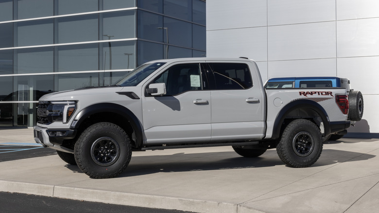 Ford F-150 Raptor 4X4 Supercrew truck at a dealership.
