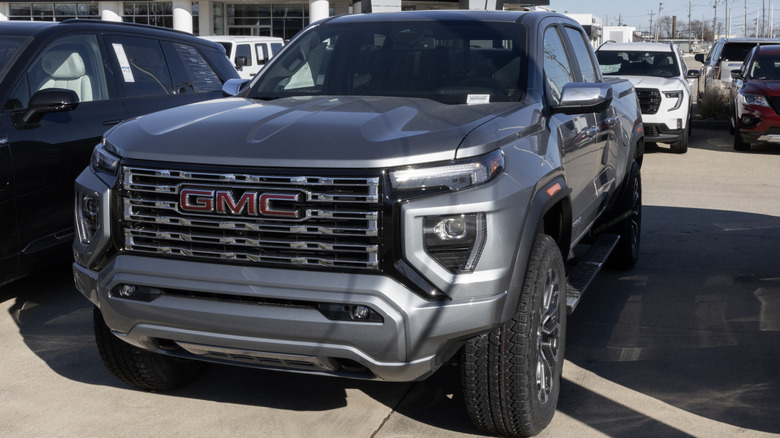 GMC Canyon 4WD Denali Crew Cab pickup display.