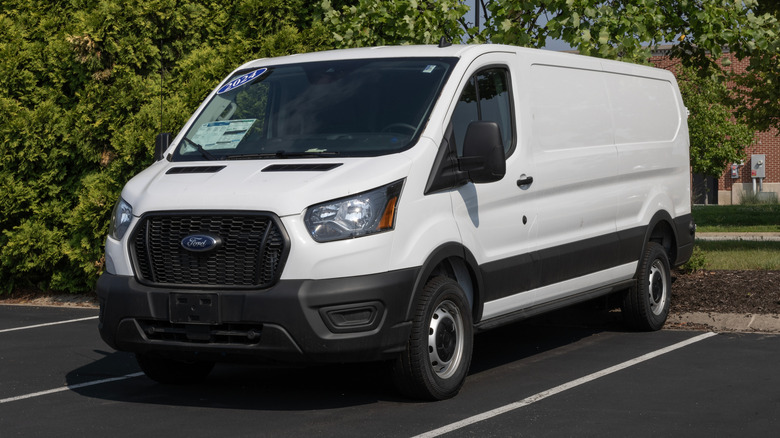 Ford Transit 150 Cargo Van RWD display at a dealership.