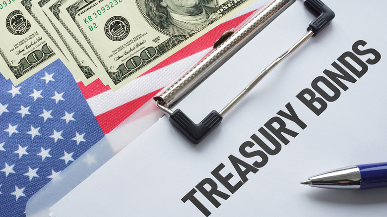 treasury bonds on a clipboard
