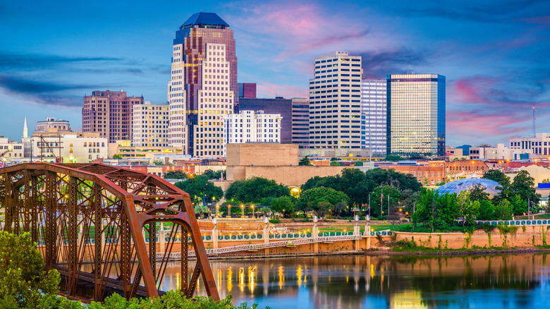 Shreveport, Louisiana, USA skyline over the Red River at dusk.