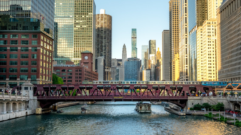 View of downtown Chicago buildings as train travels across river
