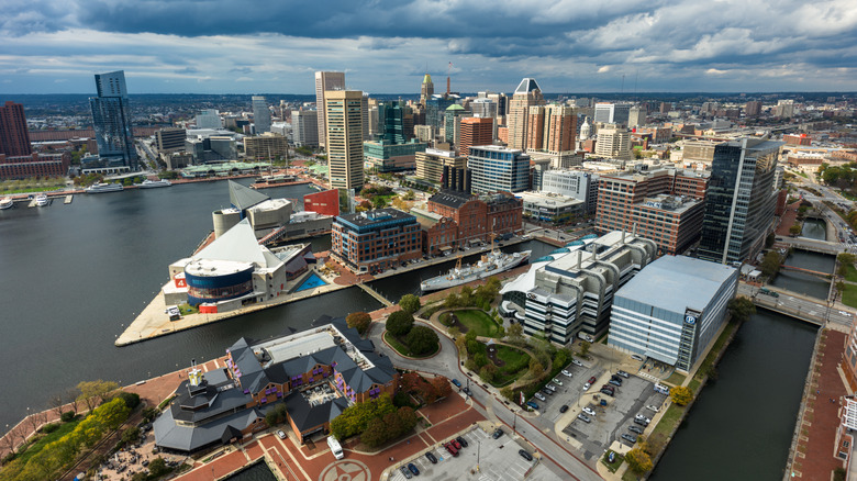 Aerial shot of Baltimore, Maryland near port on cloudy day