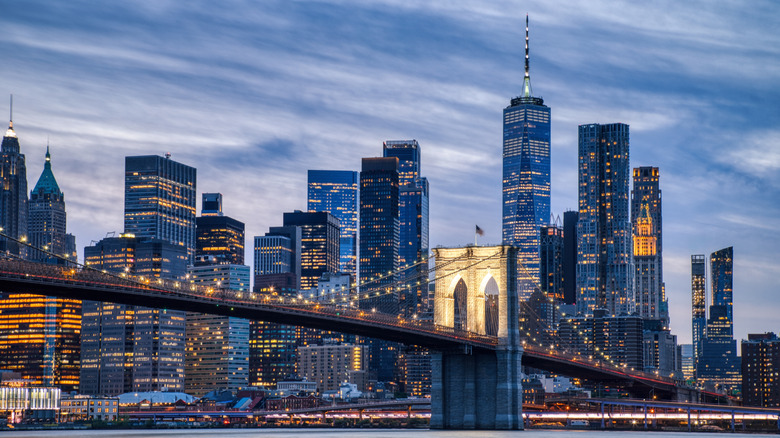 Shot of downtown Manhattan skyline with Brooklyn Bridge in foreground