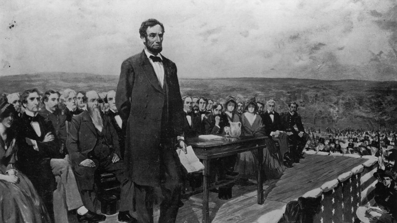 Abraham Lincoln, the 16th President of the United States of America, making his famous 'Gettysburg Address' speech at the dedication of the Gettysburg National Cemetery during the American Civil War.