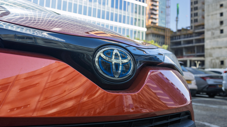 Close up front view of the Toyota emblem logo on front of car