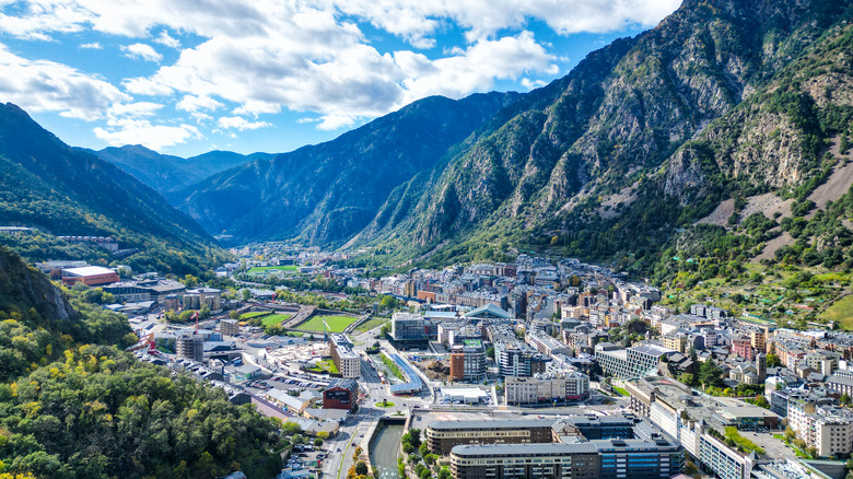 Expansive aerial view revealing the dense urban landscape nestled among the mountains of Andorra.