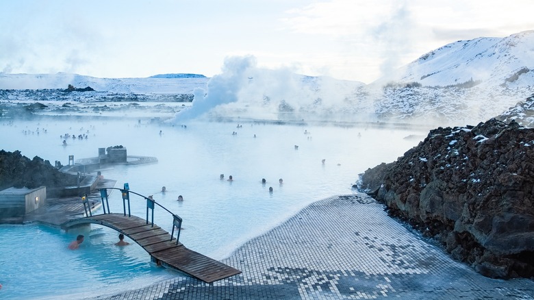 The Blue Lagoon in Iceland where visitors can swim in a natural hotspring.