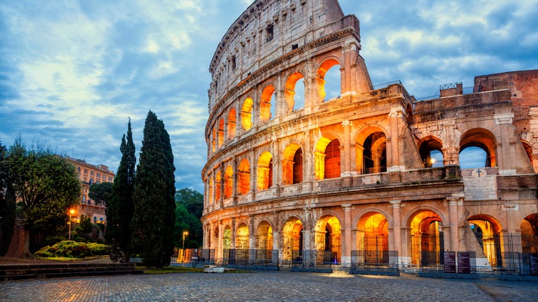 Exterior of the Rome Colosseum at dawn.