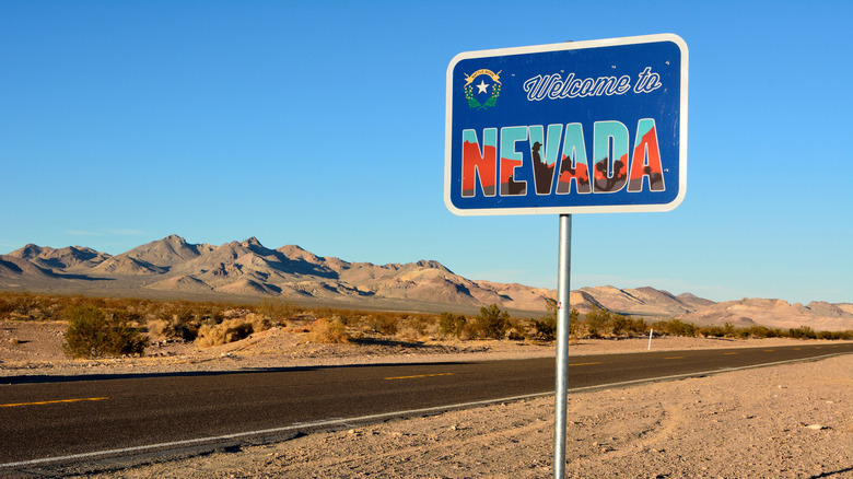 Welcome to Nevada road sign along a highway.