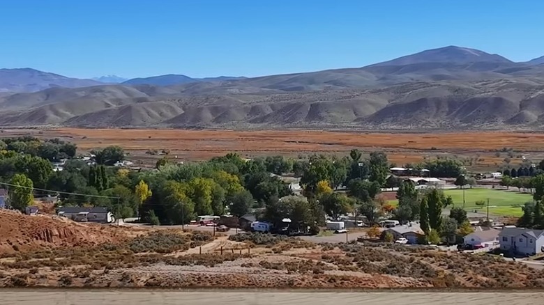 Aeriel view of town of Carlin, with mountains in the distance
