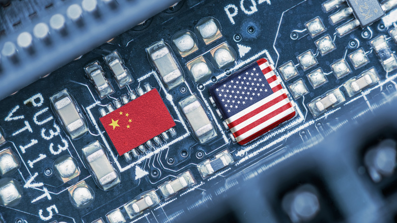US and Chinese flags on electronics components