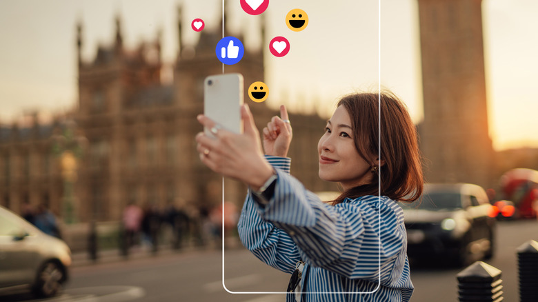 Travel blogger vlogging while exploring the city of London and receiving likes and comments from her followers